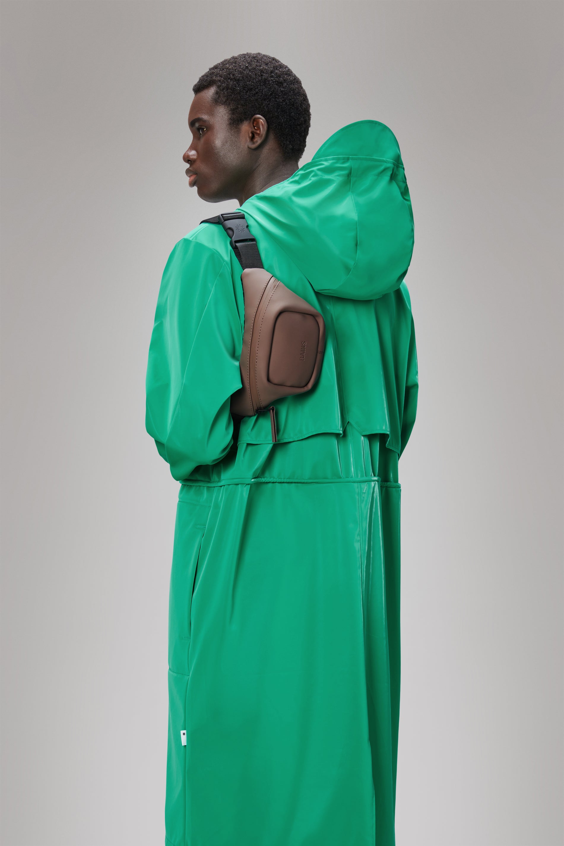 Rains green trail sling bag voor 95 gratis verzending